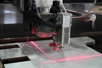 Laser cross line positioning system for waterjet cutting machine